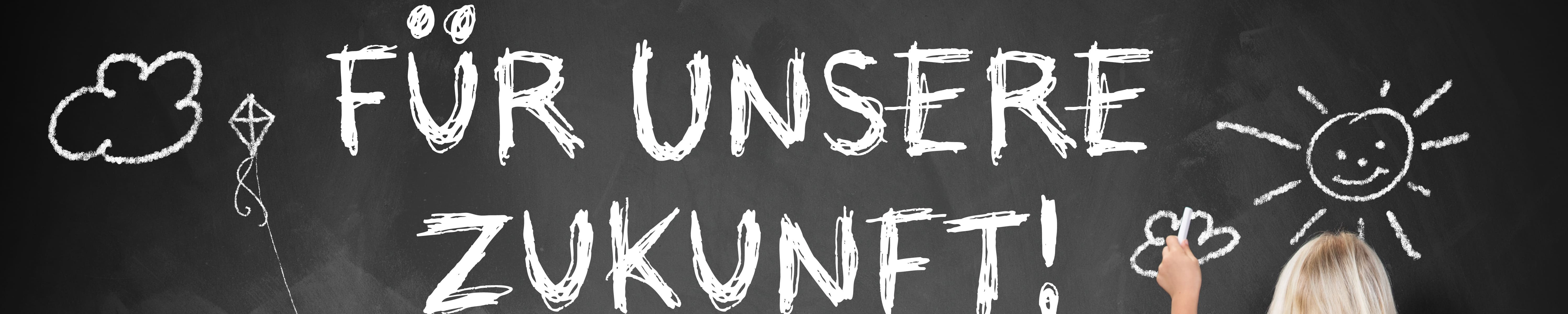 Schriftzug "Für unsere Zukunft" auf einer Tafel