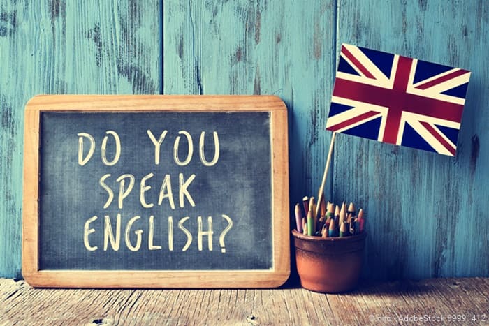 Tafel mit Schriftzug "Do you speak English?"