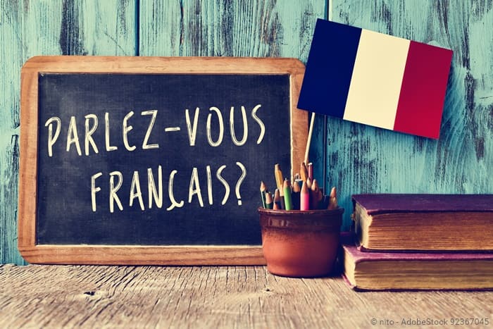 Tafel mit Schriftzug "Parlez-vous francais?"