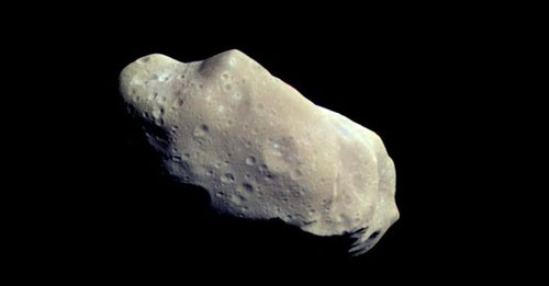 Der Asteroid (243) Ida - unregelmäßige Form und mondähnliche Oberfläche; NASA